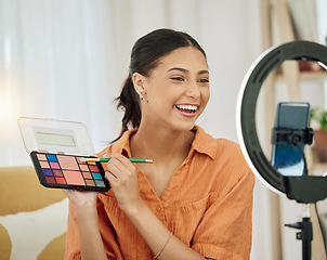 Image showing Woman, makeup influencer and live streaming on social media for beauty vlog with lighting. Female gen z content creator with cosmetics palette for online broadcast, mobile podcast and digital review