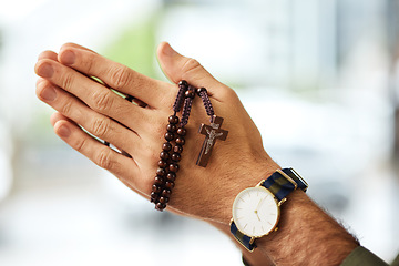 Image showing Christian man, rosary and hands praying for spiritual faith, holy gospel or worship God at church. Closeup, prayer beads and cross for support of religion, culture and praise of jesus, heaven or hope