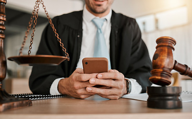 Image showing Judge, hands and professional man typing communication, networking or texting legal contact, law firm consultant or advocate. Government lawyer, smartphone and person reading attorney policy update