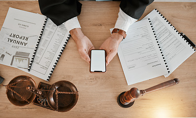 Image showing Judge hands, phone and person reading attorney communication, advertising space or contact law firm consultant. Lawyer, cellphone mockup and top view advocate work on legal, contract or policy update