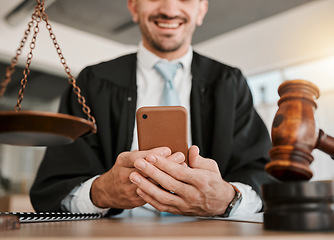 Image showing Judge hands, phone and happy man reading attorney communication, networking or contact legal consultant. Lawyer, cellphone and male advocate smile for government justice, contract or policy update