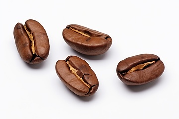 Image showing Coffee beans heap on white