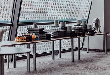 Image showing A table in a modern hotel with dishes ready to serve guests