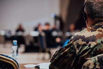 Image showing Photo of a soldier leading a seminar for professional training of military personnel