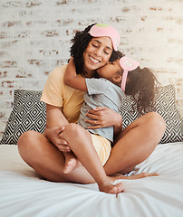 Image showing Love, hug and mother with child on bed for bonding, quality time and affection in morning. Family home, happiness and mom embrace daughter after sleeping, dreaming and relax in bedroom together