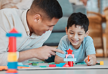 Image showing Dad, child and toys, playing on floor of living room and bonding with quality time together in family home. Learning, fun and happy father with son, building block games and smile with education.