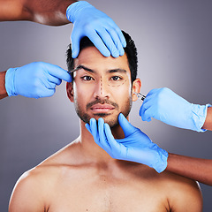 Image showing Plastic surgery, hands and drawing with filler portrait of man and surgeon for needle and syringe placement. Skincare, face and dermatology of person with medical procedure and collagen in studio