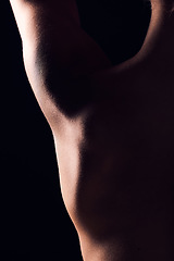 Image showing Back, dark and skin texture of person with skincare macro on a studio background for body health or wellness. Healthy, muscle and natural closeup creative for cosmetic beauty in shadow with art deco