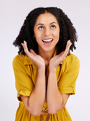 Image showing Wow, surprise and hands on face of woman in studio looking up for info, promo or news on white background. Omg, announcement and female with emoji expression to gossip, secret or unexpected wtf drama