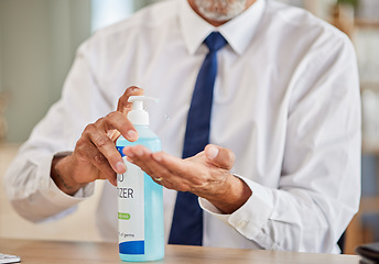 Image showing Hands, bottle and sanitizer for business man, cleaning and stop virus for health, wellness or hygiene in office. Professional person, entrepreneur or employee with product, gel or liquid for bacteria