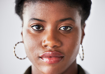 Image showing Serious, beauty and face of black woman with confidence on a white background in studio closeup. Student, portrait and African person or calm, female model with cosmetics and style in South Africa