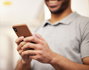 Image showing Man, hands and phone typing for social media, communication or networking at home. Closeup of male person texting or chatting on mobile smartphone app for online browsing, streaming or entertainment