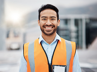 Image showing Happy asian man, technician and portrait in city for construction, installation or inspection on rooftop. Male person, engineer or contractor smile for architecture career, building or maintenance