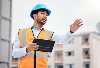 Image showing Asian man, architect and tablet in city for management on construction site, inspection or coordination. Male person, engineer or contractor working on technology for architecture or maintenance