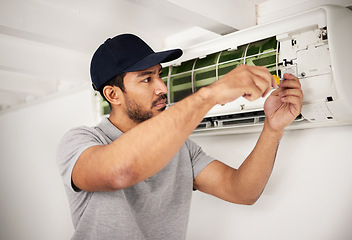 Image showing Maintenance, air conditioner technician and man with screwdriver working on ventilation for ac repair. Contractor, handyman or electric aircon machine expert problem solving, electrician with tools.