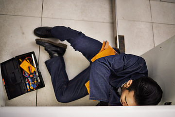 Image showing Plumbing, repair and maintenance with man in kitchen for man, industrial and inspection from above. Pipes, tools and safety with plumber fixing sink for home improvement, drainage and water system