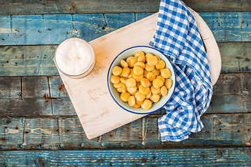 Image showing Tasty lupins and glass of beer