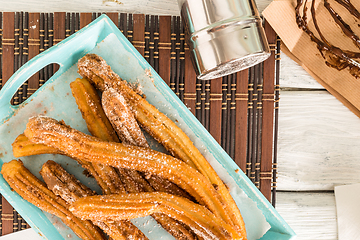 Image showing Traditional churros with hot chocolate 