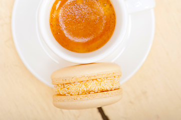 Image showing colorful macaroons with espresso coffee