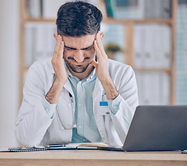 Image showing Frustrated man, doctor and headache in stress, mistake or debt from burnout, pain or deadline at the hospital. Male person or medical employee in anxiety, depression or mental health at the clinic