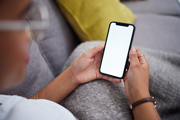 Image showing Screen, mockup and hands of woman with phone on a couch for ux, internet and web search on social media. Website, smartphone and person relax on a sofa with mobile connection or online shopping