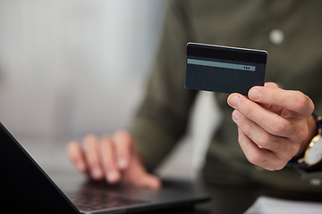 Image showing Hands, credit card and laptop with typing in office for password, cybersecurity and payment for e commerce. Person, fintech and computer for finance, saving or online shopping with deal in workplace