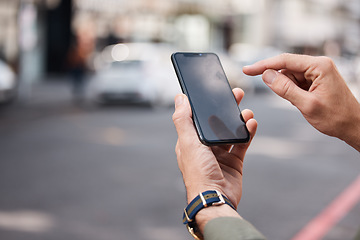 Image showing Phone, mockup and hands of man in a street with connection, contact and location. Smartphone, screen and male online for navigation app, directions and guide with network, road or website information