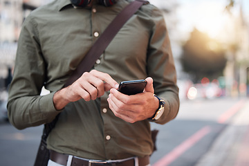 Image showing Phone, hand and man typing in a street, contact and location with navigation, network and social media. Smartphone, person and male online for app, directions and guide with internet, city or outdoor