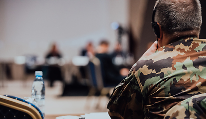 Image showing Photo of a soldier leading a seminar for professional training of military personnel