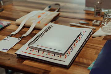 Image showing A group of documents and a schedule on the table prepared for the beginning of the seminar