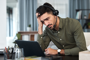 Image showing Frustrated, man and working in a call center on laptop and sad businessman with fatigue, tired and burnout in office. Consultant, computer and customer service, advice and depressed with email