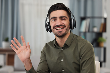 Image showing Man, portrait and wave for online meeting, video call and voip communication for telecom advisory help. Face of happy virtual assistant, salesman and consulting with headphones, hello and home office