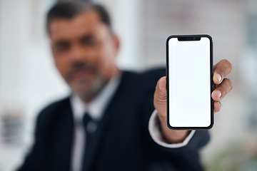 Image showing Hands, man and show phone screen in office, mock up space and logo for communication brand. Businessman, blank smartphone and ux design for mobile app, internet or fintech promo at accounting agency