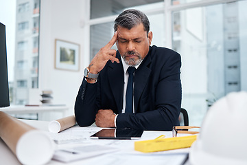 Image showing Frustrated, tired and architect man in an office with a design problem, mistake or deadline for project. Mature male engineer stress about headache, fatigue or crisis in construction industry