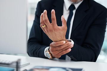 Image showing Business man, hands and wrist pain in office from osteoporosis, orthopedic joint and working on computer. Closeup of corporate worker with carpal tunnel injury, fibromyalgia or muscle fatigue at desk