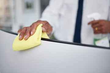 Image showing Person, hands and cleaning computer with cloth in office for hygiene, health or safety of virus. Closeup of business worker wipe dirty desktop monitor for sanitation, disinfection or bacteria of dust