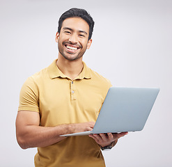 Image showing Portrait, smile and man with laptop, network and internet connection on a white studio background. Male person, guy and model with a pc, website information and happiness with an email and internet