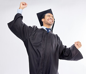 Image showing Graduation, scholarship and man in celebration of an achievement of diploma isolated in a studio white background. Winning, excited and student from a university or college happy for a certificate