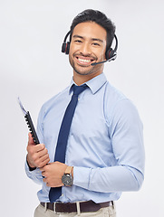 Image showing Call center, portrait and Asian man with documents for telemarketing, crm support and consulting isolated on a white studio background. Face, smile and sales agent with paperwork for customer service