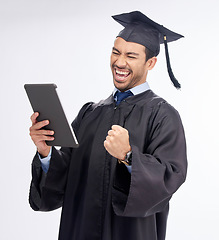 Image showing Graduation, tablet and man in celebration of an internet achievement isolated in a studio white background. Diploma, excited and student from a online learning university or college with certificate