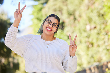 Image showing Peace sign, woman portrait and outdoor with a smile of student on summer holiday and vacation. Motivation, happy and emoji v hand gesture feeling silly with freedom and female person from Sudan