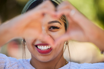 Image showing Heart hands, happy and portrait of woman in park for support, health and kindness symbol. Love, emoji and motivation with person and gesture in nature for empathy, trust and valentines day icon