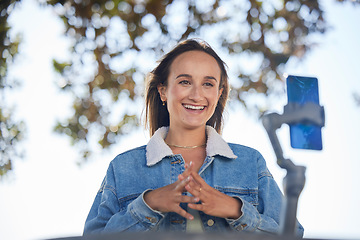 Image showing Phone, outdoor influencer and happy woman live streaming, broadcast and record video for social network post. Selfie stick, cellphone communication and park person podcast on online media application