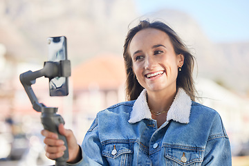 Image showing Phone, selfie stick and happy woman, influencer or gen z person live streaming, broadcast or record social network video. Virtual media vlog, smartphone communication and girl podcast on mobile app