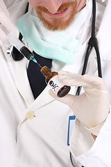 Image showing doctor with poison bottle 