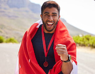 Image showing Flag, excited winner or portrait of man with success on road for fitness goal, race or running competition. Proud National champion runner, winning or happy sports athlete with victory glory or medal