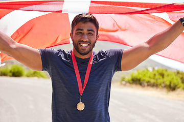 Image showing Portrait, flag and man with a medal for winner, sports competition or winner in the street. Happy, Denmark and a professional athlete with representation of a country in running or national triathlon