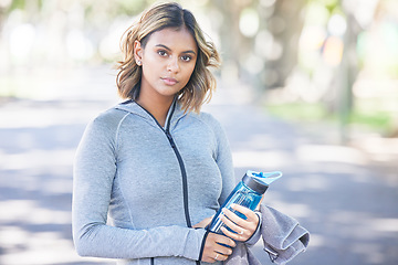 Image showing Portrait, fitness and woman outdoor, exercise and water bottle with wellness, healthy and sports. Face, person and athlete outside, street or hydration with training, workout goals, athlete or liquid