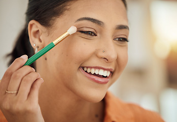 Image showing Brush, makeup and woman with a smile, beauty and skincare with dermatology, self care and happiness. Person, happy and girl with cosmetic tool, eyeshadow for facial treatment and applying product