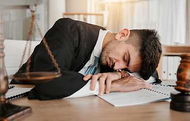 Image showing Judge, sleeping and office man tired after working on legal paperwork, court documents or advocate justice. Government, law firm lawyer and male attorney fatigue, dream and burnout after policy work